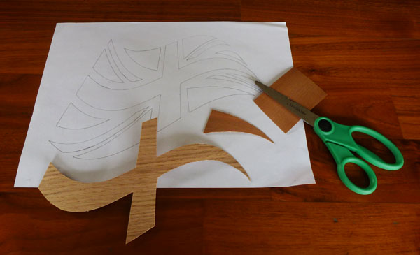Draw your picture and cut out veneer shapes